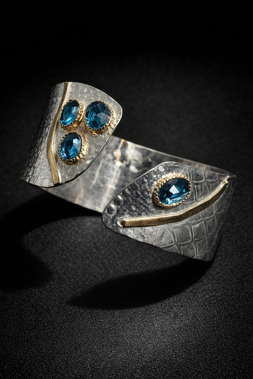Sterling Silver 14k Yellow Gold: Large Blue Topaz